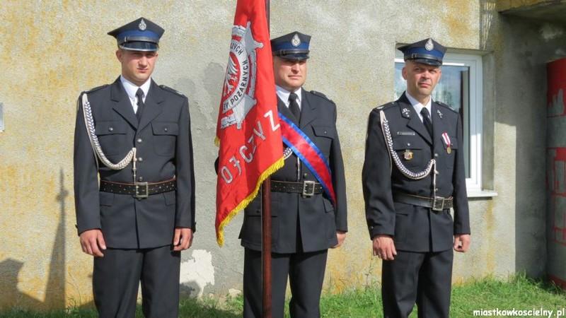 Druhowie z odznakami za wysługę lat