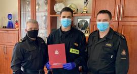 st.sekc. Rafał Smoliński - Strażak-bohater wyróżniony za wykazaną odwagę podczas akcji ratowniczo-gaśniczej.       