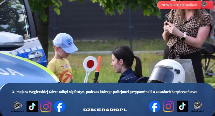 Policjanci z Węgierskiej Górki edukują dzieci podczas pikniku z okazji Dnia Dziecka